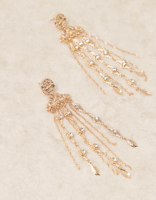 ASOS DESIGN drop earrings with boho crystal tassel detail in gold tone