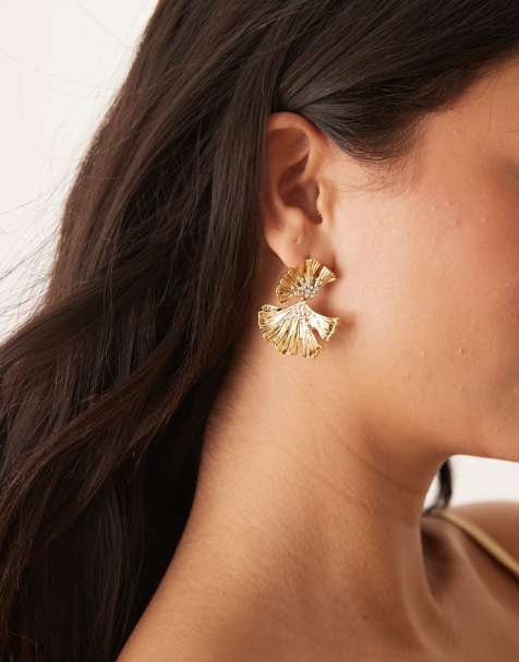 ASOS DESIGN drop earrings with crystal and textured leaf design in gold tone - view 1