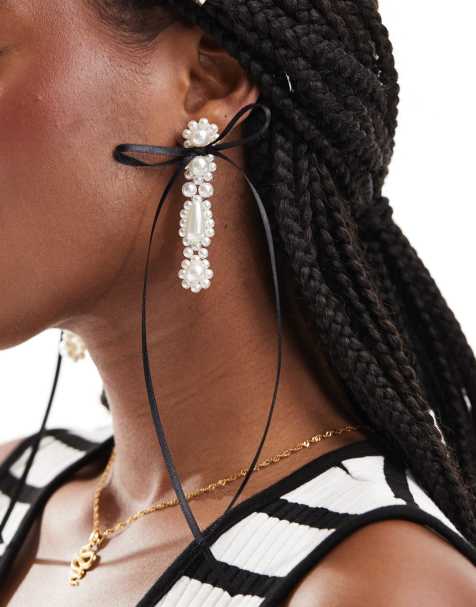 ASOS DESIGN drop earrings with faux pearl and bow detail - view 1