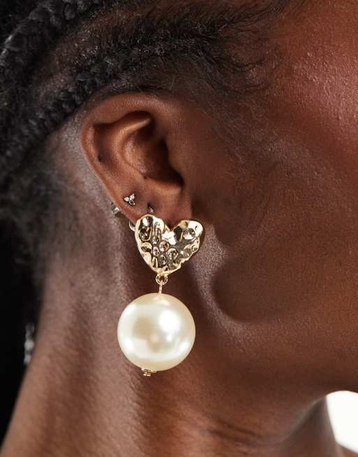  ASOS DESIGN drop earrings with hammered heart and faux pearl design in gold tone