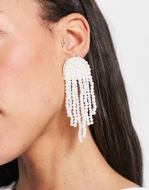 ASOS DESIGN drop earrings with pearl tassel design in cream - view 1