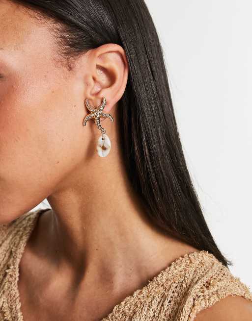 ASOS DESIGN drop earrings with seashell design in gold tone