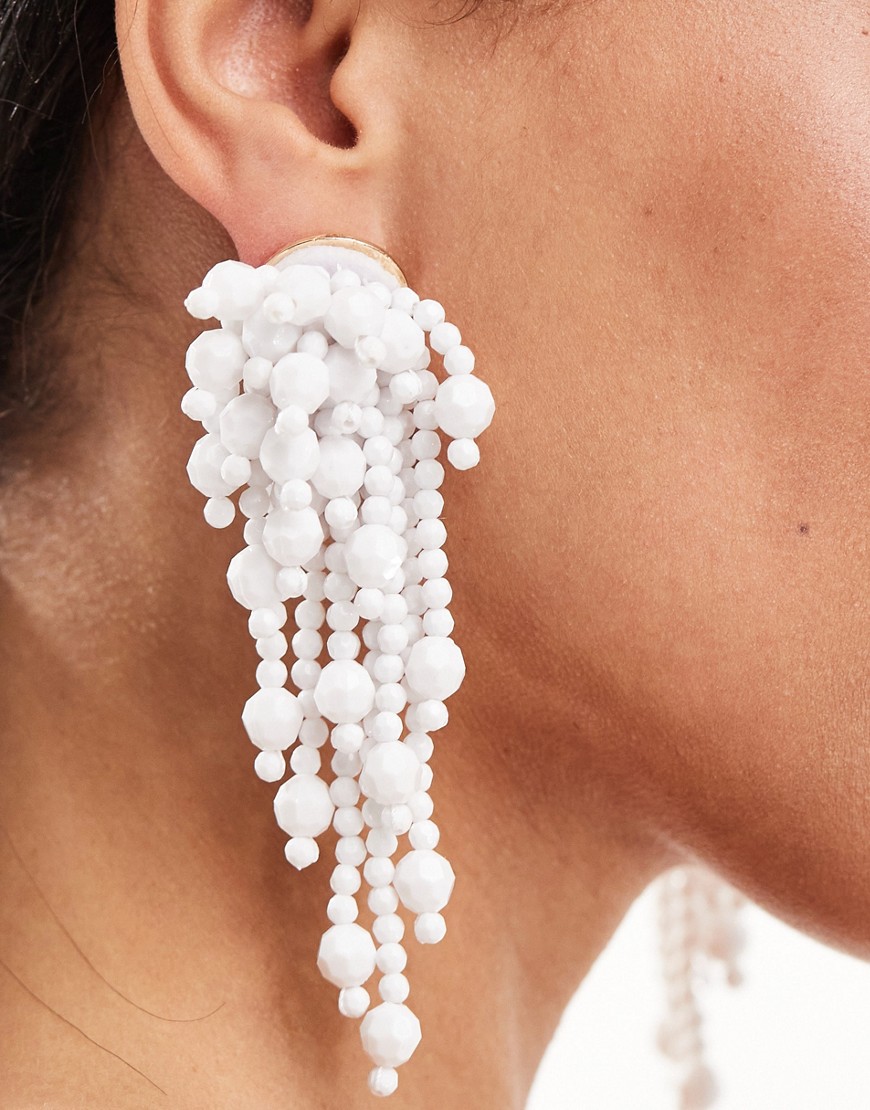 ASOS DESIGN drop earrings with waterfall bead detail in white