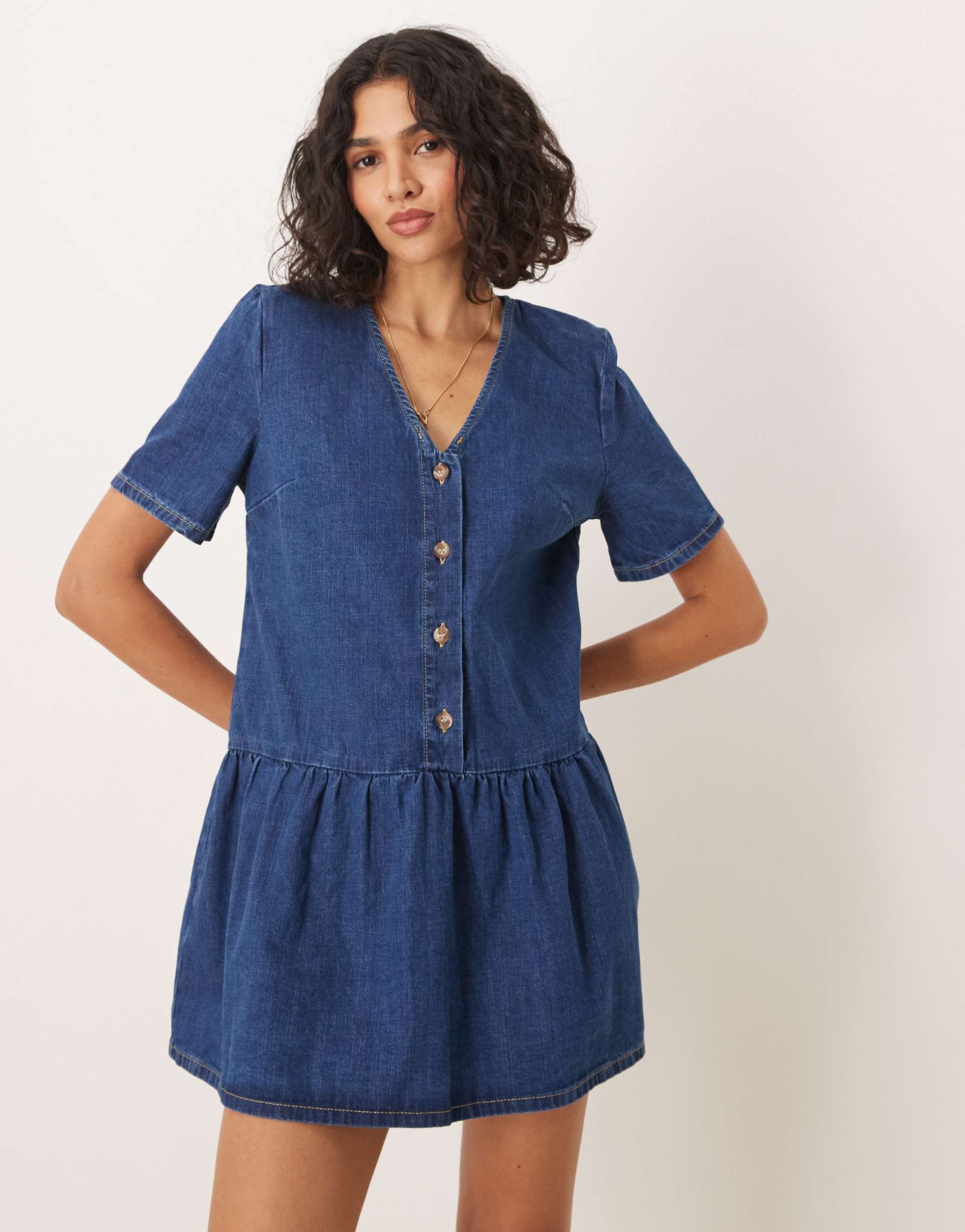 asos design drop waist denim v-neck mini dress in indigo