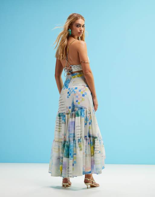 ASOS DESIGN dropped waist maxi dress with high low hem in washed postcard print