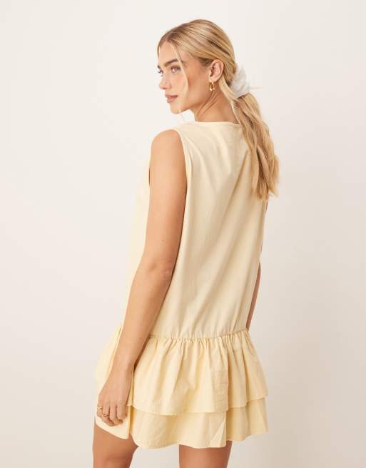ASOS DESIGN dropped waist poplin mix oversized mini dress in lemon