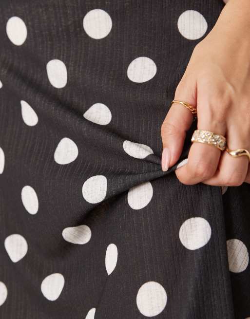 ASOS DESIGN dry handle rib polka dot awkward length low rise skirt in black, 5 of 5