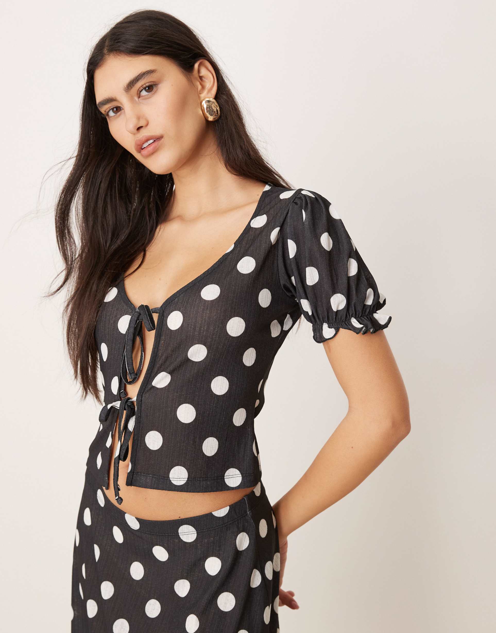 asos design dry handle rib tie front puff sleeve polka dot top in black - part of a set