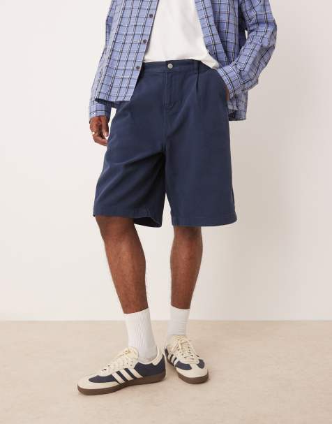 ASOS DESIGN long length pleated shorts in navy
