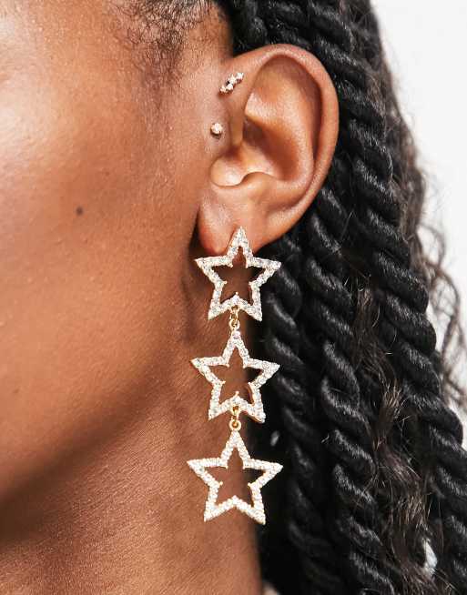 ASOS DESIGN – Długie kolczyki w odcieniu złota z gwiazdkami zdobionymi kryształkami