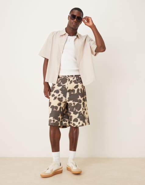 ASOS DESIGN – Długie szerokie szorty we wzór w krowie łaty - view 1