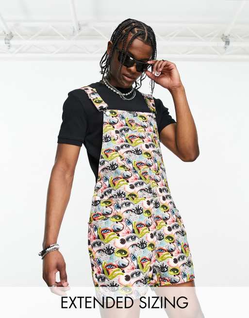 ASOS DESIGN dungaree in short length with all over eyes print