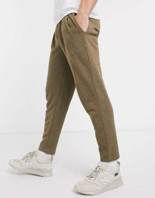 Asos Design Dunkelgrun Melierte Schmal Zulaufende Jogginghose Mit Bundfalten Asos