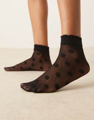 ASOS DESIGN - Durchscheinende knöchelhohe Socken in Schwarz mit Punkten und Rüschensaum