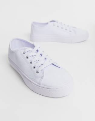 white lace up tennis shoes