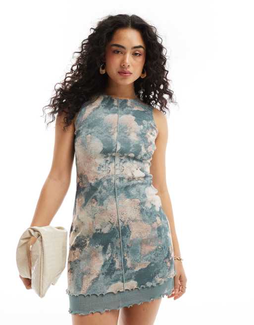 ASOS DESIGN – Dwuwarstwowa sukienka mini bez rękawów z siateczką i ozdobnymi szwami we wzór marmurkowy