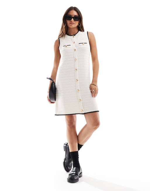 ASOS DESIGN – Dzianinowa fakturowana sukienka mini w kolorze kremowym z czarną lamówką