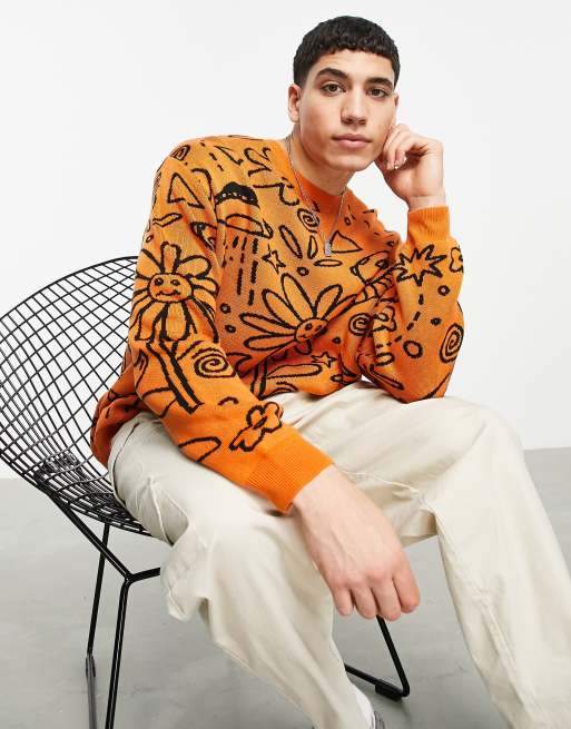 ASOS DESIGN – Dzianinowy sweter oversize w pomarańczowym kolorze we wzór w rysunki