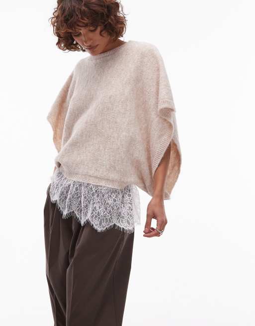 ASOS DESIGN – Dzianinowy top o kroju pelerynki z domieszką wełny w kolorze ecru z koronkowym wykończeniem