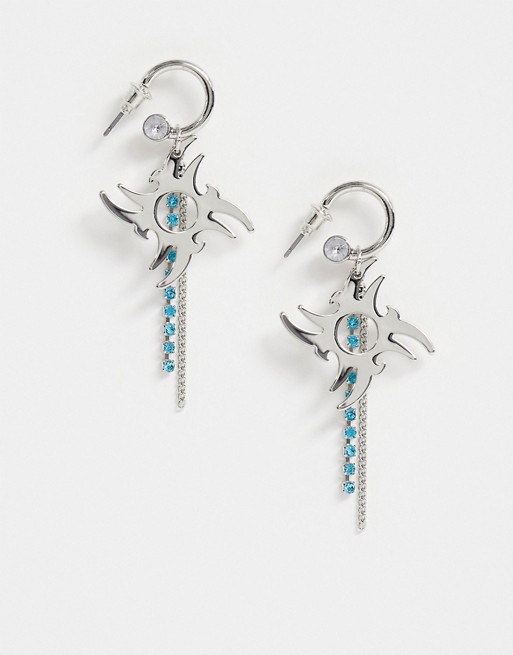 ASOS DESIGN earrings in tattoo design with blue crystal in silver tone