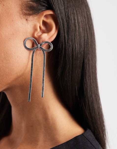 ASOS DESIGN earrings with bow design in silver tone - view 1