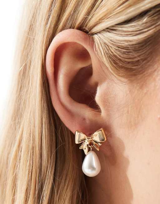  ASOS DESIGN earrings with mini bow and faux pearl drop design on gold tone