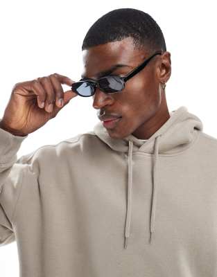 Eckige, schmale 90er-Sonnenbrille in Schwarz mit getönten Gläsern Schwarz No Size