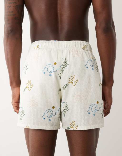 ASOS DESIGN - Ecrufarvede korte badeshorts med print i bæk-og-bølge-stof, 5 af 5