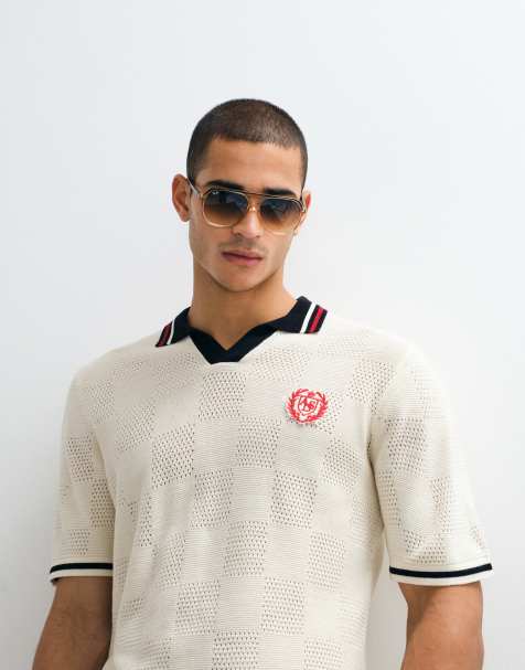 ASOS DESIGN - Ecrufarvet og marineblå polotrøje i strik i fodboldstil med afslappet pasform og hak i halsen med broderi - view 1
