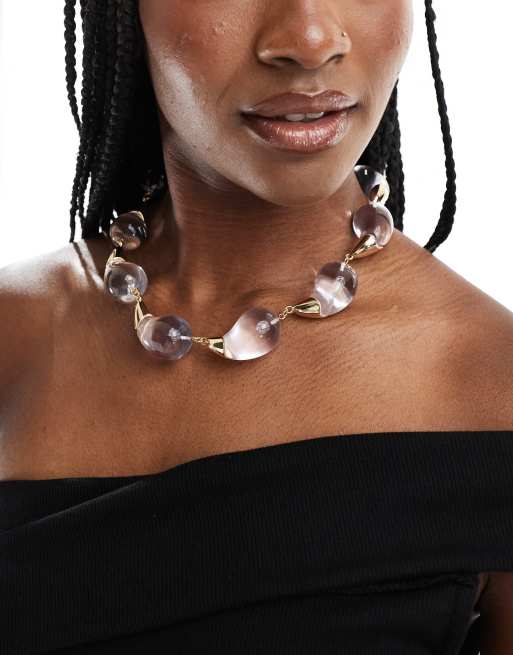 ASOS DESIGN - Edizione limitata - Collana color oro con gocce in resina trasparenti