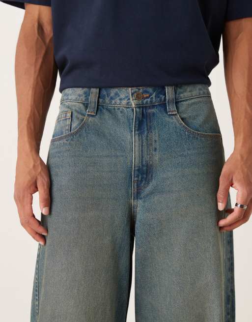 ASOS DESIGN ekstremt baggy jeans i mellemvask blå med brun tone, 4 af 5