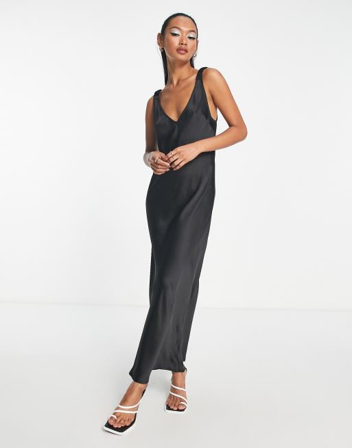 ASOS DESIGN elasticated back satin slip midi dress in black | ASOS