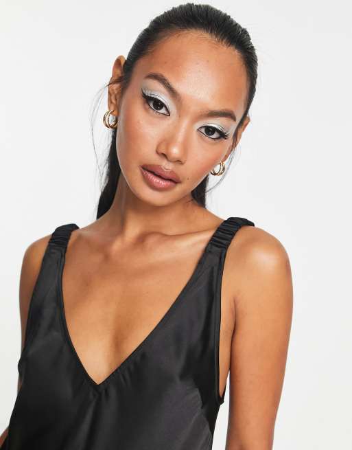ASOS DESIGN elasticated back satin slip midi dress in black | ASOS