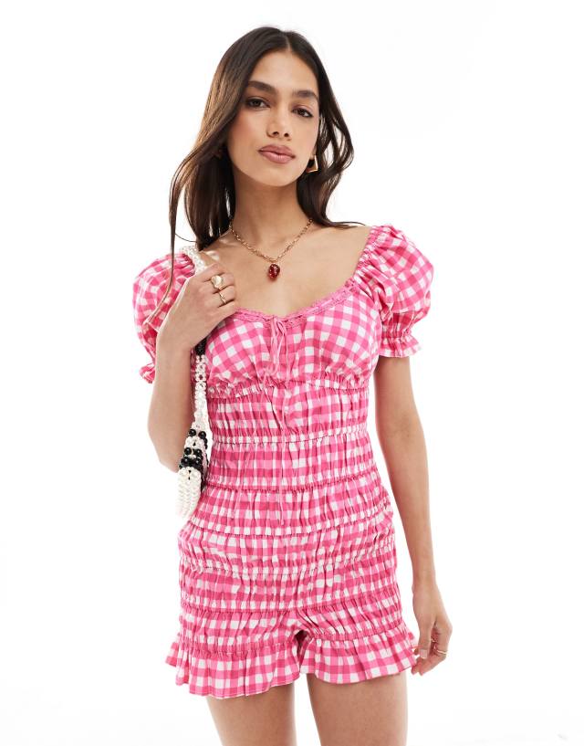 ASOS DESIGN - elasticated channel lace trim bow playsuit in pink gingham