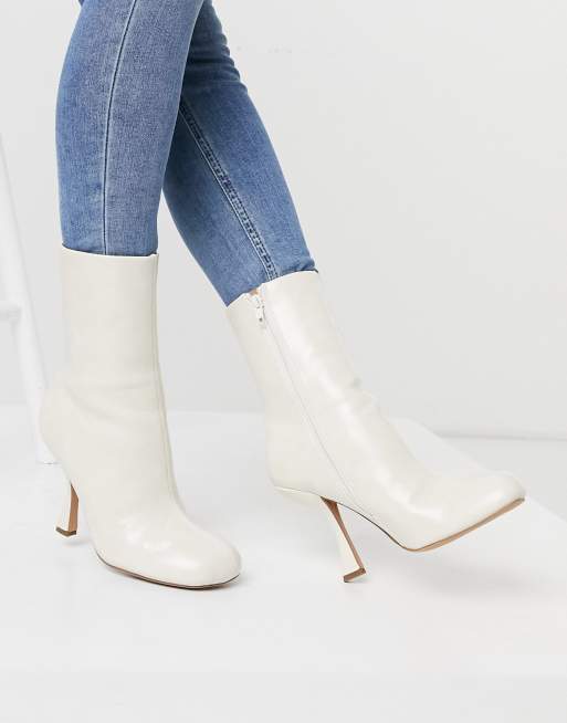 ASOS DESIGN Electric high heeled ankle boots in off white