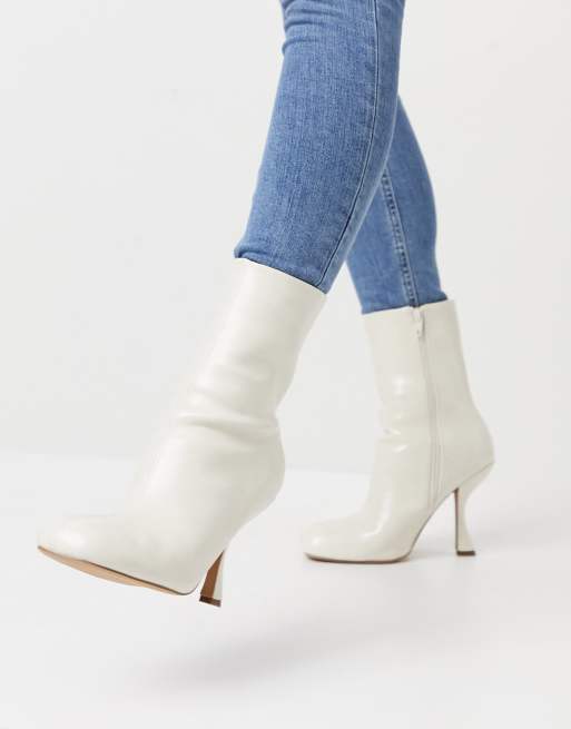 ASOS DESIGN Electric high heeled ankle boots in off white