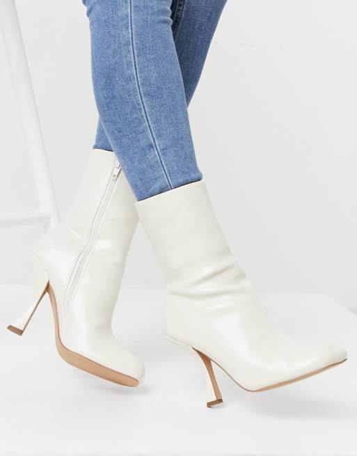 ASOS DESIGN Electric high heeled ankle boots in off white