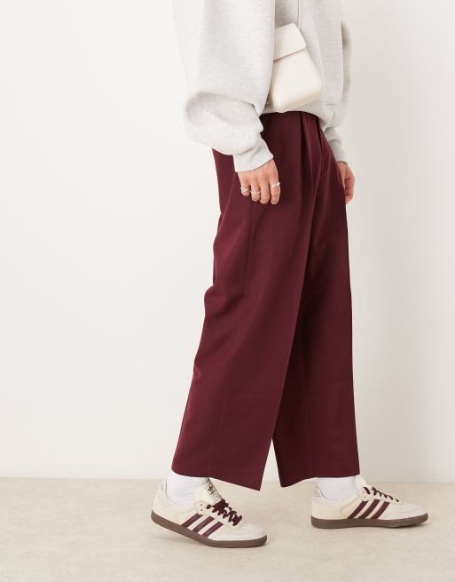 ASOS DESIGN – Eleganckie bordowe spodnie z balonowymi nogawkami i zakładkami z przodu