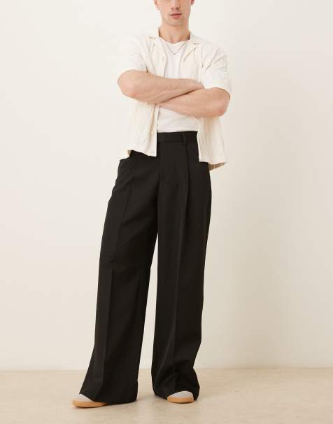 ASOS DESIGN – Eleganckie czarne spodnie o luźnym kroju z zakładkami z przodu - view 1