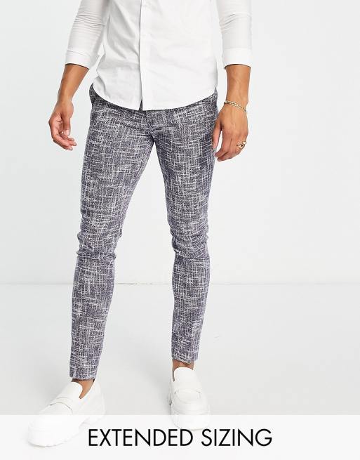 ASOS DESIGN – Eleganckie granatowe spodnie o obcisłym kroju z mieszanki bawełny w drobny teksturowany wzór