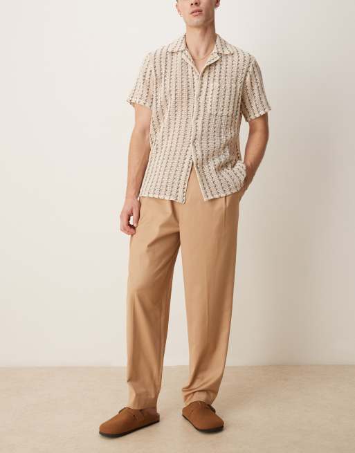 ASOS DESIGN – Eleganckie spodnie chinosy ze zwężanymi nogawkami, podwójnymi zakładkami i elastyczną talią