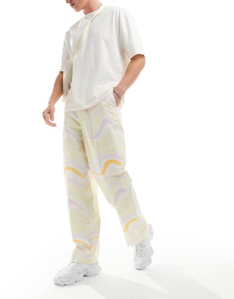 ASOS DESIGN – Eleganckie spodnie z szerokimi nogawkami w kolorowy, falisty wzór - view 1