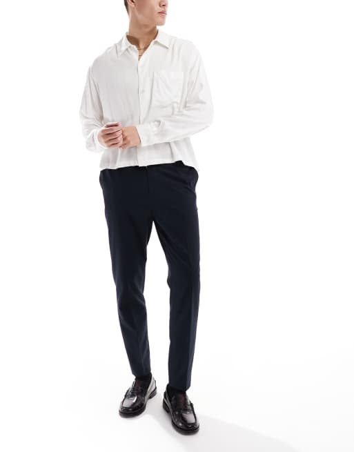 ASOS DESIGN – Eleganckie zwężane spodnie w granatowym kolorze
