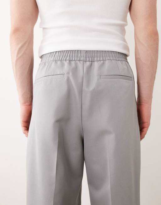 ASOS DESIGN - Elegante broek met wijde pijpen en elastische taille in marineblauw, 3 van 5