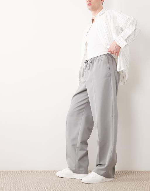 ASOS DESIGN - Elegante broek met wijde pijpen en elastische taille in marineblauw, 4 van 5
