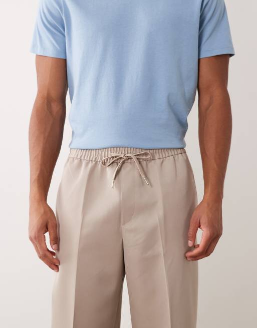 ASOS DESIGN - Elegante broek met wijde pijpen en elastische taille in stone, 2 van 5