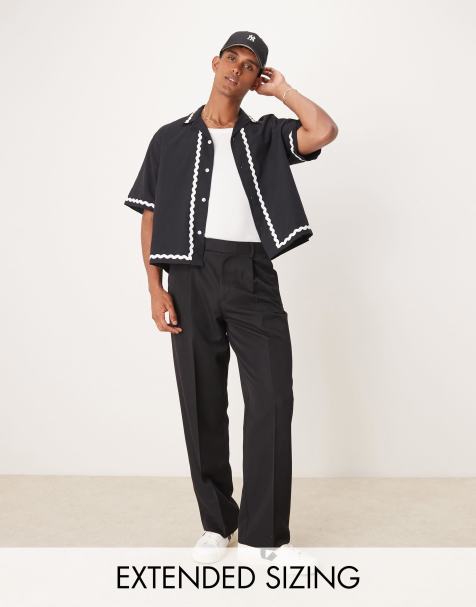 ASOS DESIGN - Elegante bukser med vidde og plisseringer fortil i sort - view 1