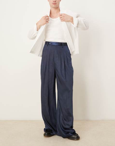 ASOS DESIGN – Elegante Hose aus Satin in Marineblau mit lockerem Beinschnitt und drei Bundfalten - view 1