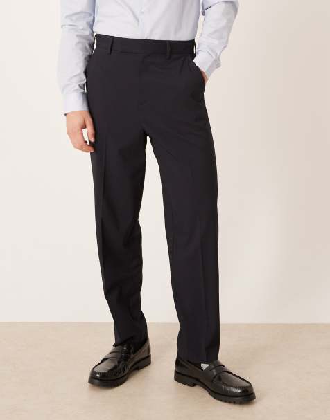 ASOS DESIGN – Elegante Hose in Marineblau mit lockerem Schnitt und schmal zulaufendem Bein - view 1