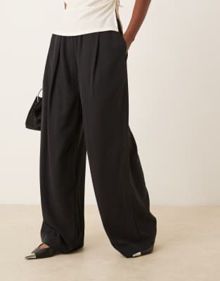 ASOS DESIGN - Elegante Hose in Schwarz mit niedrigem elastischem Bund